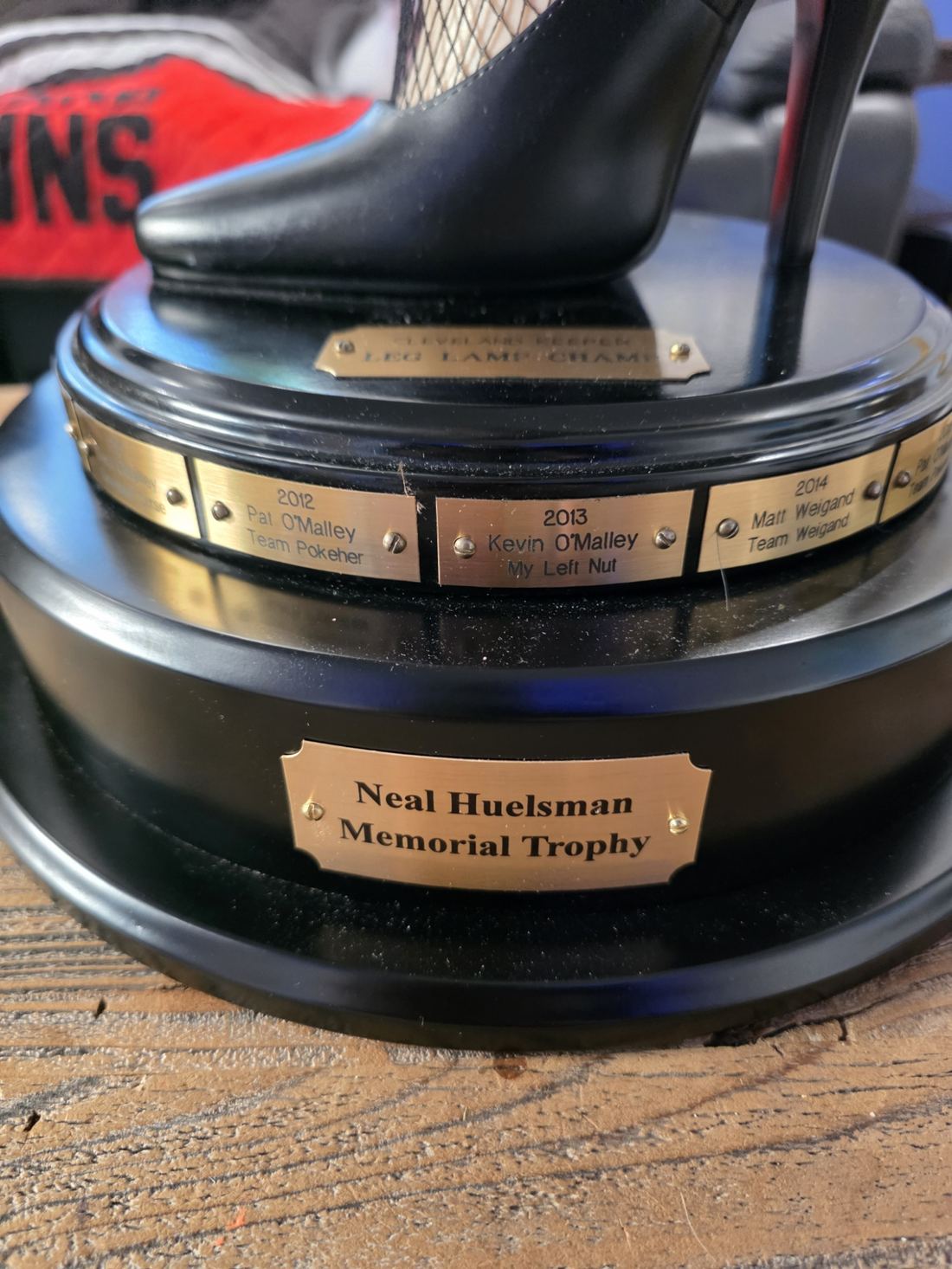 Neal Huelsman Memorial Trophy with past champions engraved