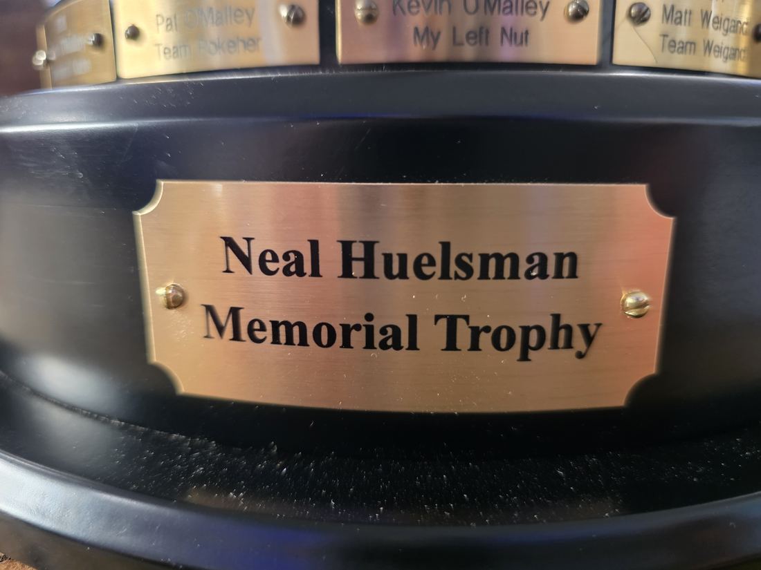 Neal Huelsman Memorial Trophy nameplate